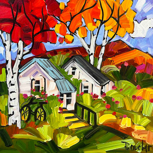 Colorful acrylic painting of a small white cottage with a blue roof, surrounded by bright green and yellow foliage, red and orange autumn trees, a bicycle, and a blue sky.